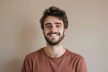 Obraz premium A close up portrait of a young man with a subtle smile