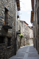 View of the street in the old town on a day. Location vertical. Castellfollit de la Roca. Spain.