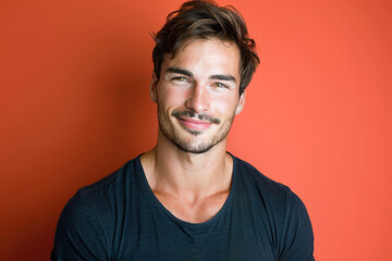 Obraz premium A close up portrait of a young man with a subtle smile