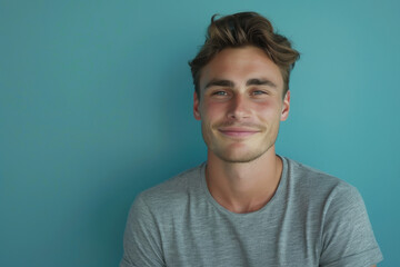Fototapeta premium A close up portrait of a young man with a subtle smile