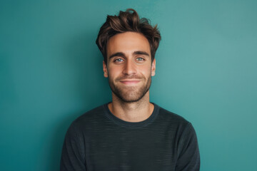 Fototapeta premium A close up portrait of a young man with a subtle smile