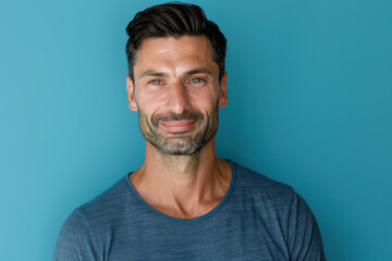 Fototapeta premium A close up portrait of a young man with a subtle smile