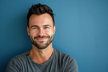 Obraz premium A close up portrait of a young man with a subtle smile