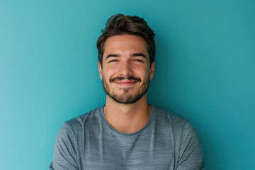 Fototapeta premium A close up portrait of a young man with a subtle smile