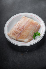 fish fillet raw white giant sea bass and filleting fresh cooking meal food snack on the table copy space food background rustic top view