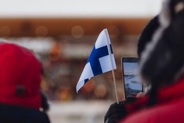 person with finnish flag