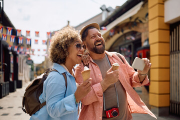 Cheerful couple of tourists having fun on their vacation.