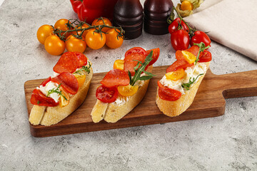 Bruschetta tapas with chorizo and tomato