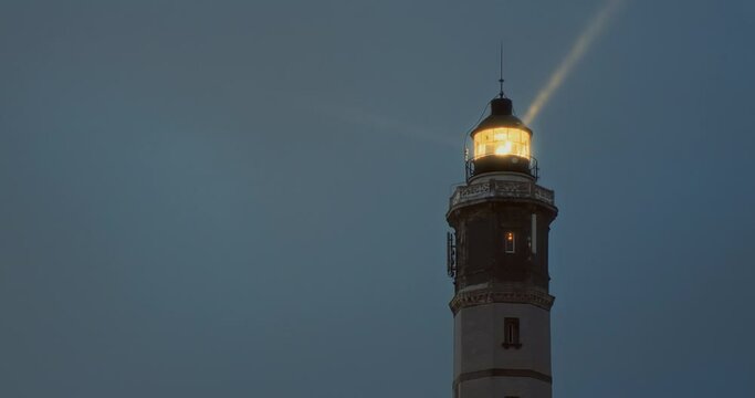 Lighthouse Illumination: The lighthouse gradually lights up, casting a warm and inviting glow