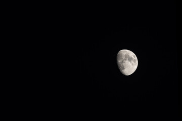 The Moon in the Waxing gibbous Lunar phase (view from Northern Hemisphere) on a dark night sky