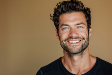 Obraz premium A close up portrait of a young man with a subtle smile