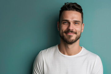 Fototapeta premium A close up portrait of a young man with a subtle smile