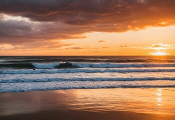 A person standing on a beach, with waves crashing against the shore, and a beautiful sunset in the background