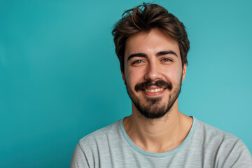 Fototapeta premium A close up portrait of a young man with a subtle smile