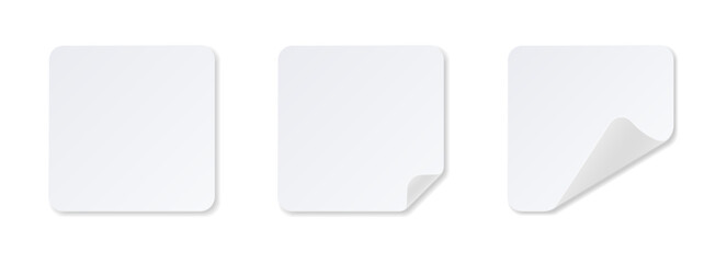Set of white square stickers with rounded folded corner.