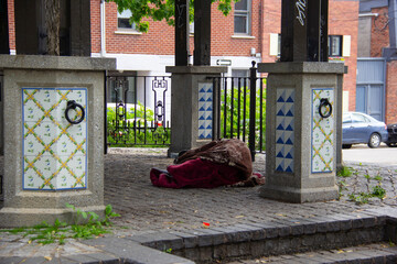 Homeless person sleeping in a gazebo
