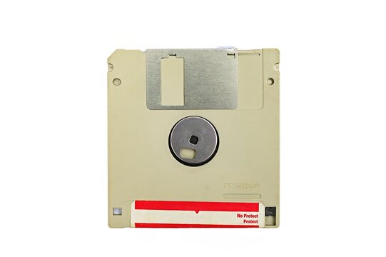 Old 3.5-inch floppy disk or diskette isolated on white background - Powered by Adobe