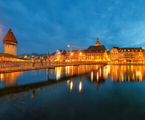 Breathtaking historic city center of Lucerne with famous buildings and old wooden Chapel Bridge (Kapellbrucke)