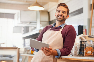 Coffee shop, portrait and man on tablet for online menu, check stock and inventory for order. Restaurant, cafeteria and small business owner on digital tech for social media, networking and website