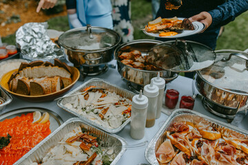 Table with delicious food outdoor party 