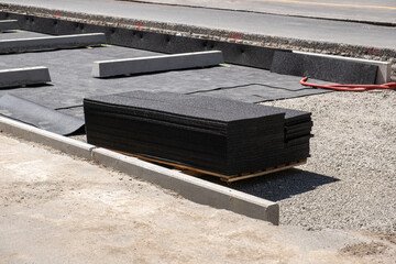 pneumatic pad at a construction site of tram tracks in a European city street. Made from recycled...