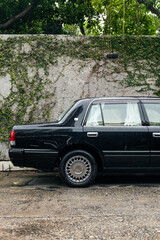 Luxurious black car with white curtains looks like an official automobile
