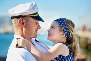 Smile, uniform and father carry child with love relationship, patriotic service and military hero with support. Dad, girl and hug with marine soldier for happy reunion or goodbye and navy seal career