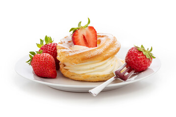 Cream puffs and fresh strawberries on a white plate. Isolate on a white background