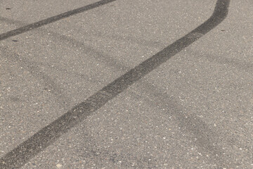 Fototapeta premium tire tracks during dangerous driving on the road