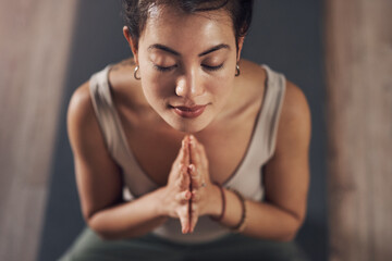 Woman, praying hands and yoga meditating, wellness and calm exercise for workout or health club or...