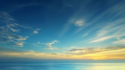 A beautiful blue sky with a few clouds and a calm ocean