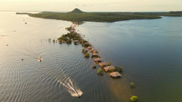 Aerial drone footage of "Alter do Chao" beach with most of its sandy shore submerged by the waters of the Tapajos river during the flood season