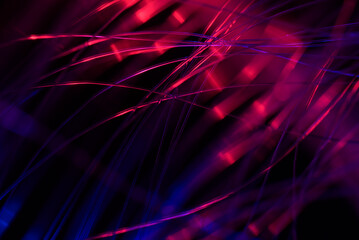 abstract background with lights in optical fibers on a black background