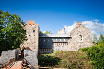 Main entrance to Sigulda medieval castle, also called siguldas viduslaiku pils, a major landmark of Latvia and of the city of Sigulda, in Summer.