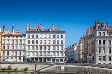 Obraz premium Typical facades old buildings of the vieux Lyon on the Peninsula called Presqu'Ile, the historical center of the second biggest city of France in summer. Lyon is one of the main cities in france.