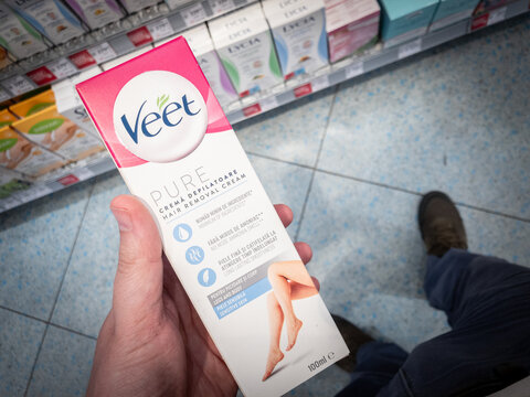 BELGRADE, SERBIA - MAY 12, 2024: Logo on a Veet Pure Hair Removal Cream for sale in Belgrade. Veet is a british brand specialized in hair removal products.