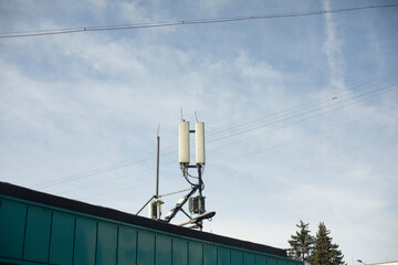 Rooftop antennas. Radio communication on building. Signal transmission.