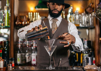 Stylish cocktails: a professional bartender in action