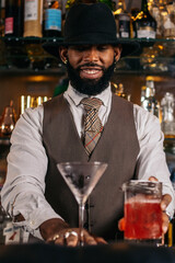 The magic of mix: a bartender preparing his best creations