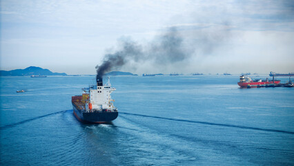 Smoke exhaust gas emissions carbon dioxide from cargo lagre ship container ship,Marine diesel...
