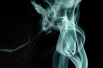 Close up of incense smoke abstract on black background