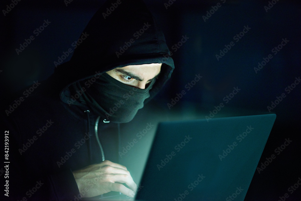 Fototapete man, laptop and hoodie on black background for hacking, phishing and malware with virus. hacker, tec