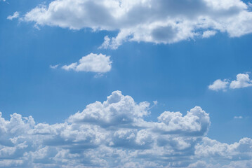 gentle clouds in the blue sky
