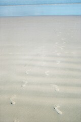 footprints on the beach