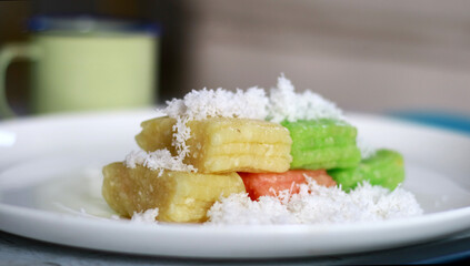 Getuk lindri. Indonesian traditional food. Steamed cassava cake sprinkled with grated coconut.    