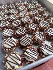 Homemade Malaysian biscuits during celebration of Eid Mubarak called Red Velvet Button Cookies