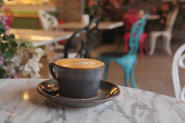 late coffee on cafe table at cafe background 
