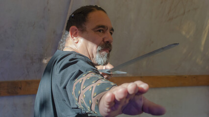 Warrior with sword calculating his attack