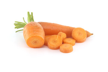 Whole carrot alongside its sliced pieces over white background