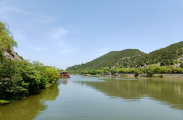 Fototapeta premium China, Luoyang, Longmen Grottoes, river bank near the grottoes 